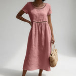 Dusty rose embroidered midi dress with round eyelet-trim neckline and short sleeves
