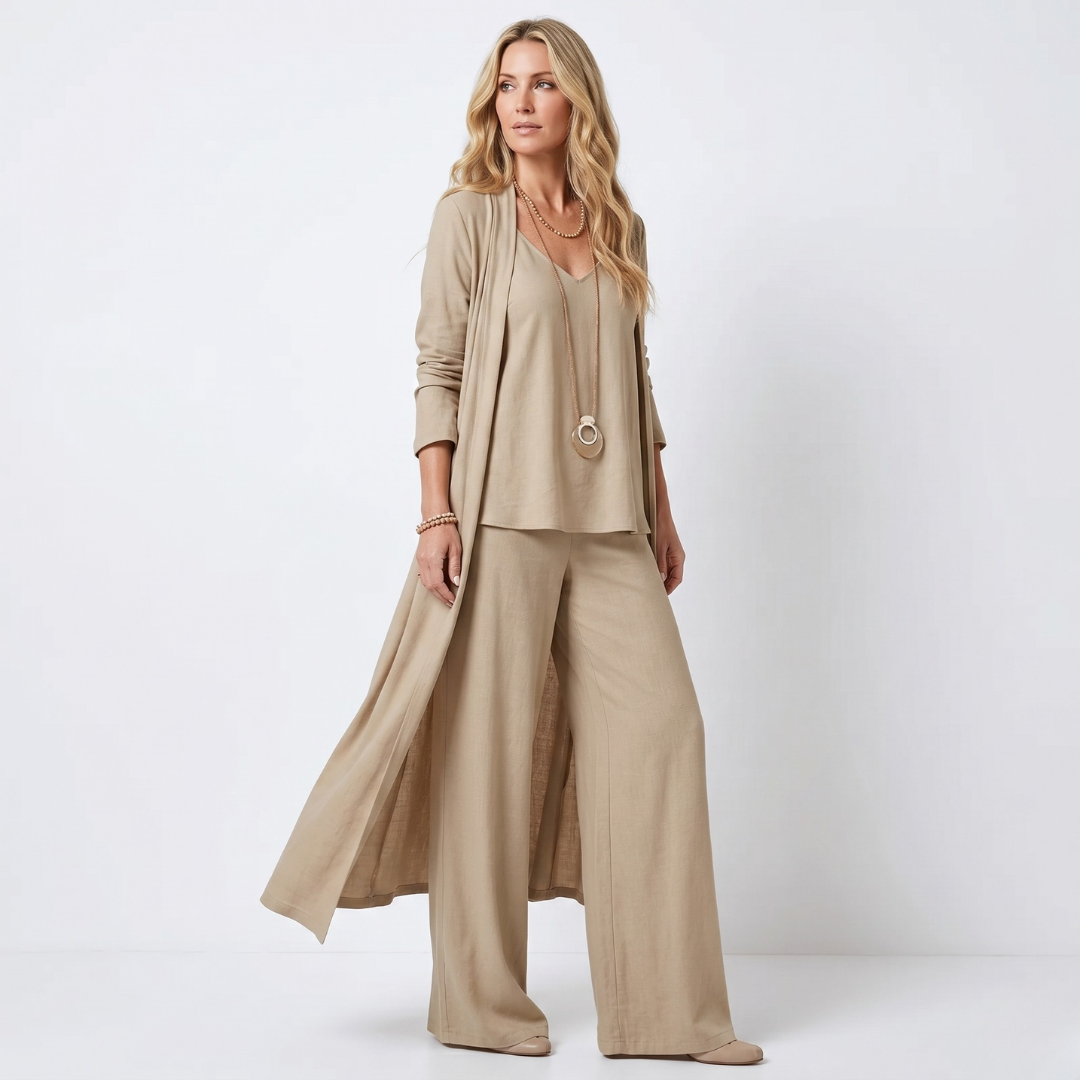 Taupe 3-piece set with long duster, layered top, and wide-leg trousers.