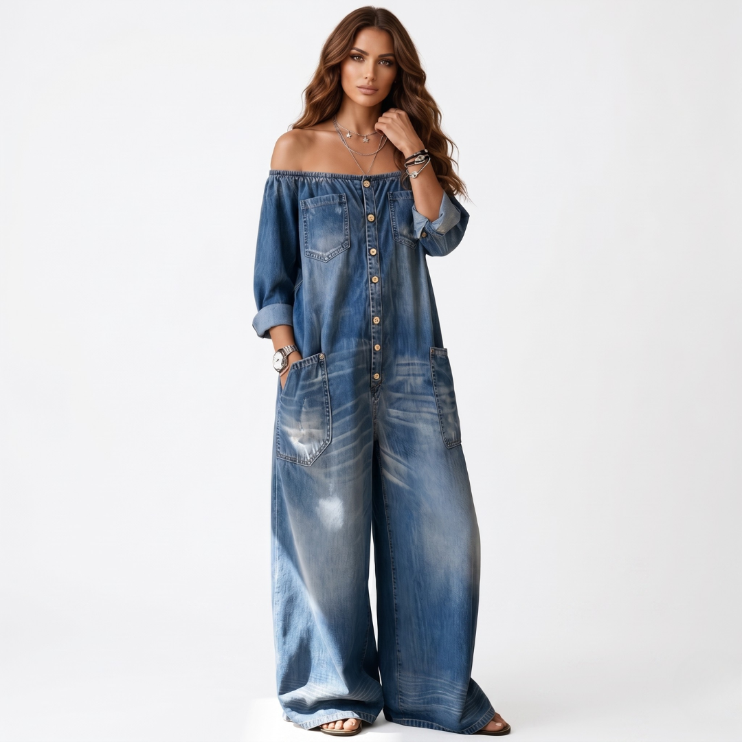Blue denim off-shoulder jumpsuit with deep neckline, button front, wide legs, pockets
