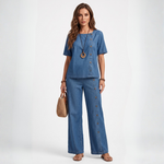 Blue denim two-piece set with short-sleeve button-up top and wide-leg pants
