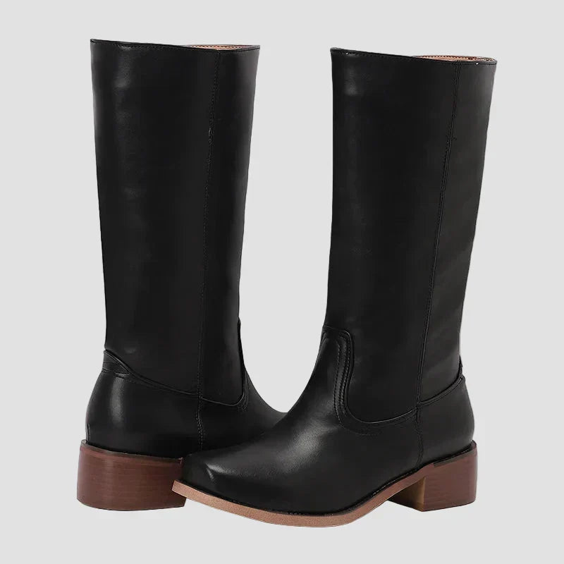 Black tall pull-on equestrian boots with block heel and side goring details