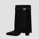 Black tall boots with wide cuff, block heel, and front buckle detail
