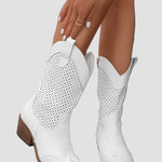 White cowboy ankle boots with perforated upper and block heel