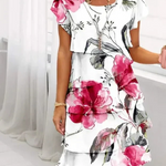 Floral tiered mini dress with layered ruffle hem and short puff sleeves, white with pink blooms