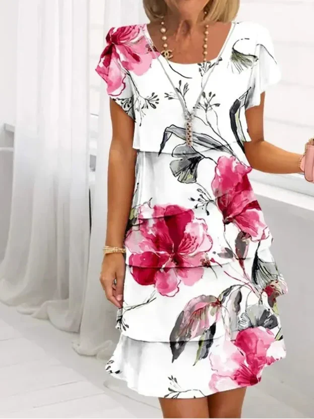 Floral tiered mini dress with layered ruffle hem and short puff sleeves, white with pink blooms