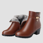 Brown ankle boots with faux fur cuff, side zipper, and chunky block heel