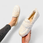 Beige warm slip-on slippers with fuzzy lining and moccasin-style stitching