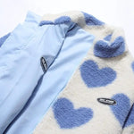 Reversible winter jacket detail: light blue panel with heart fleece trim
