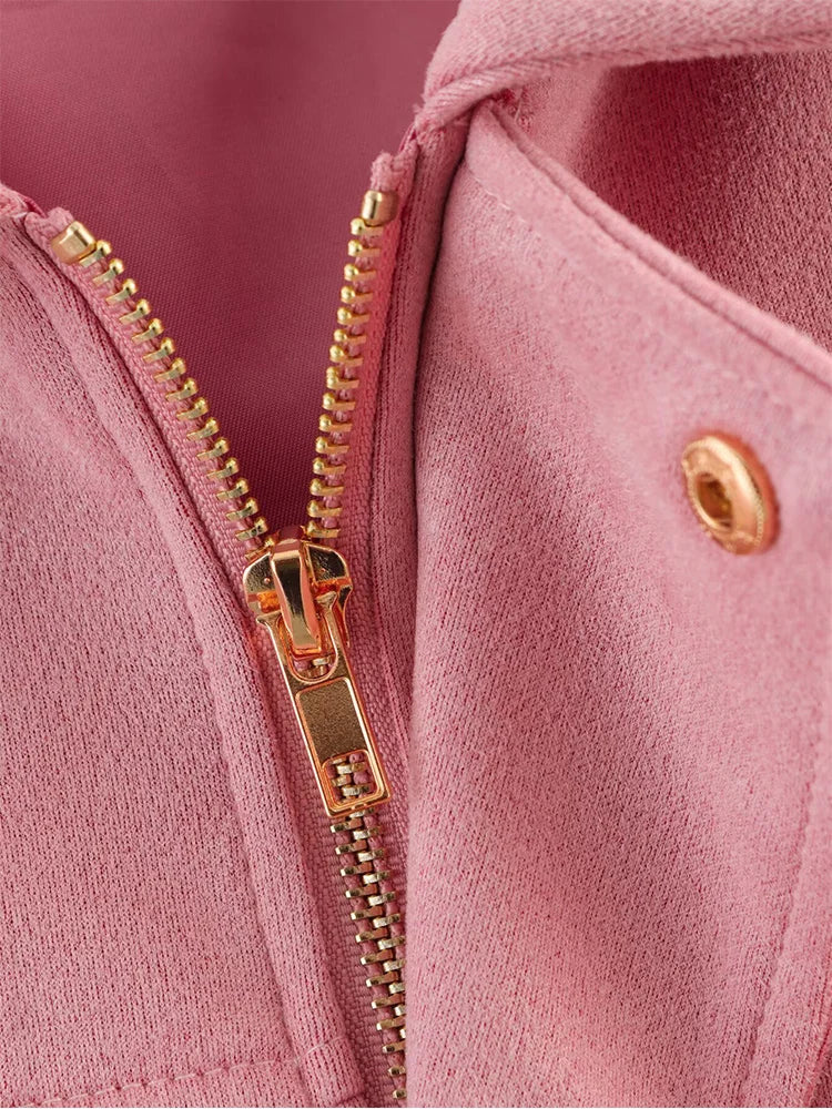 Pink short elegant jacket zipper and button detail with gold hardware