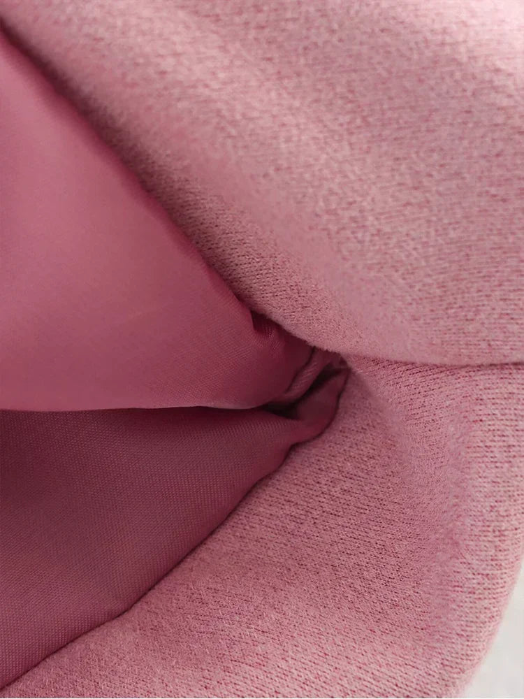Pink short elegant jacket sleeve cuff detail with textured fabric