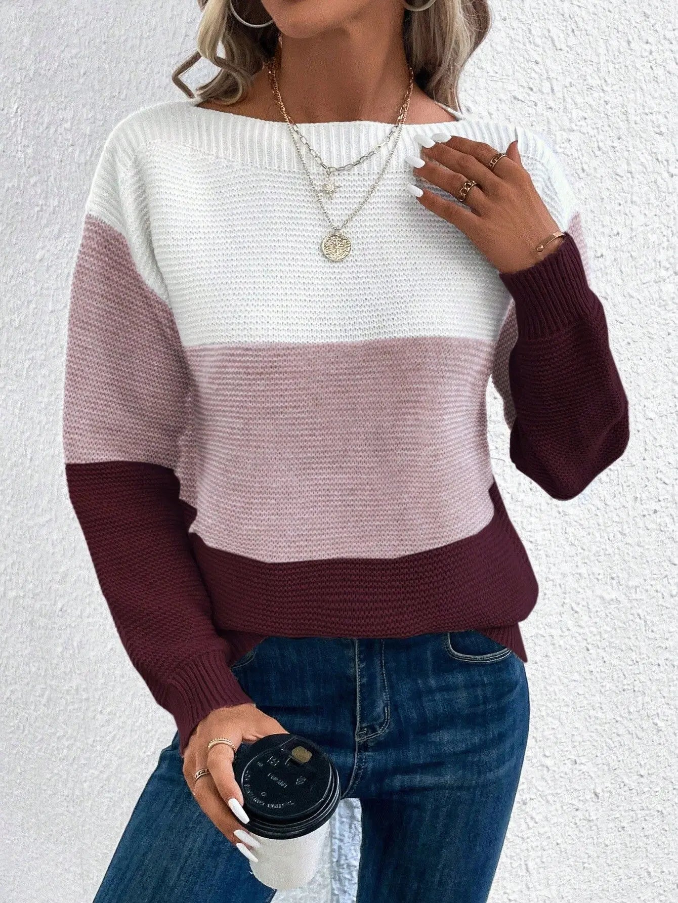 Color-block knit sweater, crew neck, long sleeves; white, mauve, and dark plum panels.