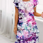 Purple and pink floral print dress with ruching at waist and ruffled short sleeves