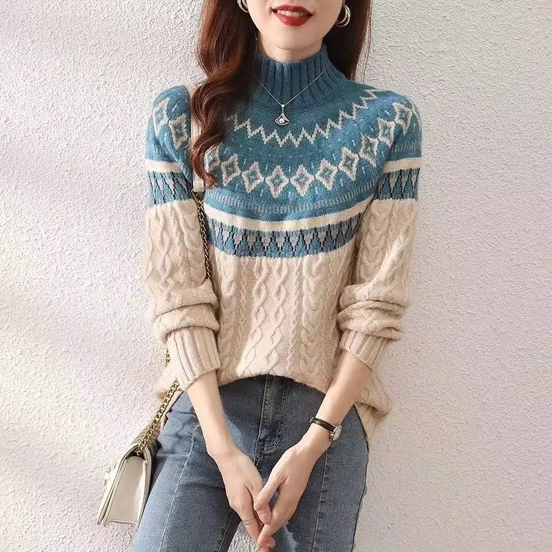 Women's winter knit sweater with high neck, long sleeves, blue-and-white patterned yoke