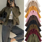 Short elegant jackets on display in multiple colors, collared style