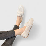 Cream warm slip-on slippers with fuzzy lining and moccasin-style stitching