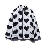 White-and-black heart patterned fleece lining for reversible winter jacket with zip