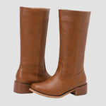 Cognac tall pull-on equestrian boots with low block heel and stitched panels