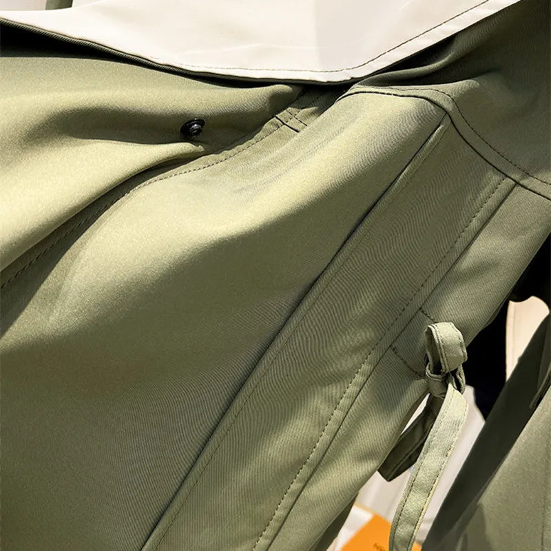 Modern jacket front, sage green with placket and adjustable drawcord at collar