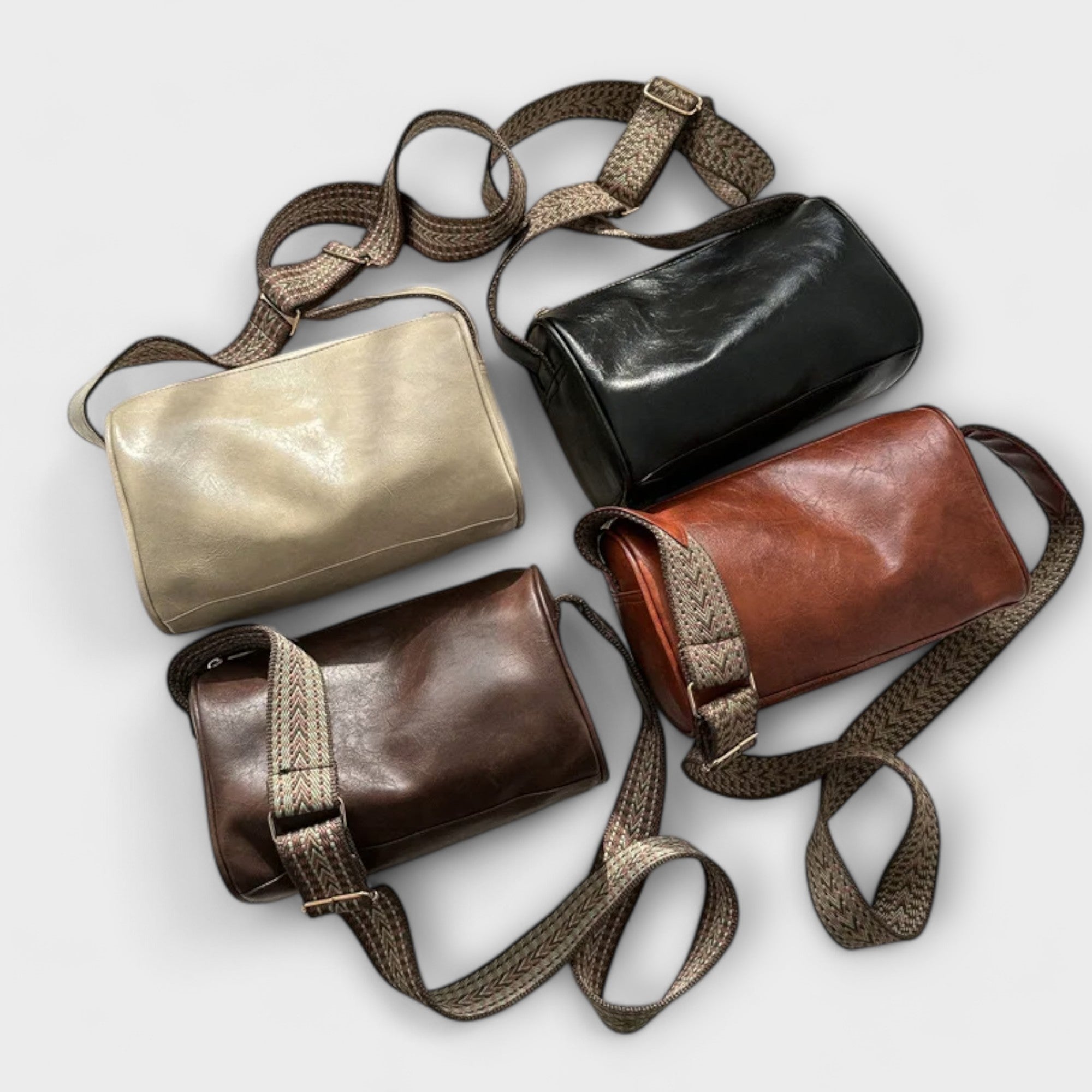 Assorted retro crossbody bags in beige, black, and brown with woven straps and zips.