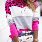 Leopard print knit pullover sweater in white, gray, and bright pink with ribbed cuffs