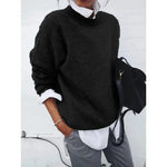 Black crewneck pullover sweater with long sleeves, relaxed fit