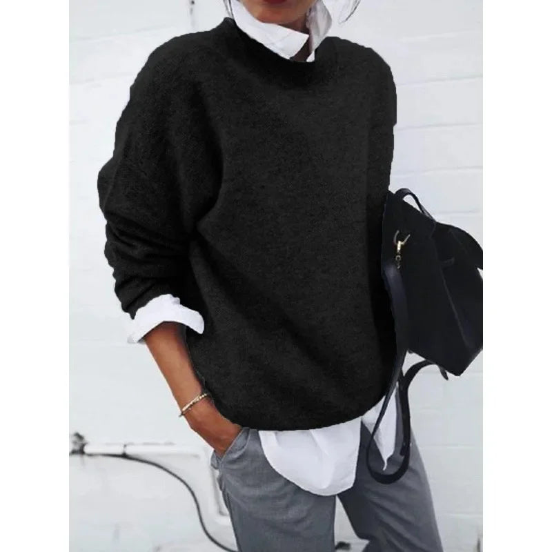 Black crewneck pullover sweater with long sleeves, relaxed fit