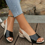 Orthopedic heeled sandals, black croc-texture straps with white sides and open toe