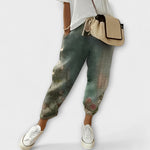 Boho tapered pants with dark green watercolor print, drawstring waist, elastic cuffs