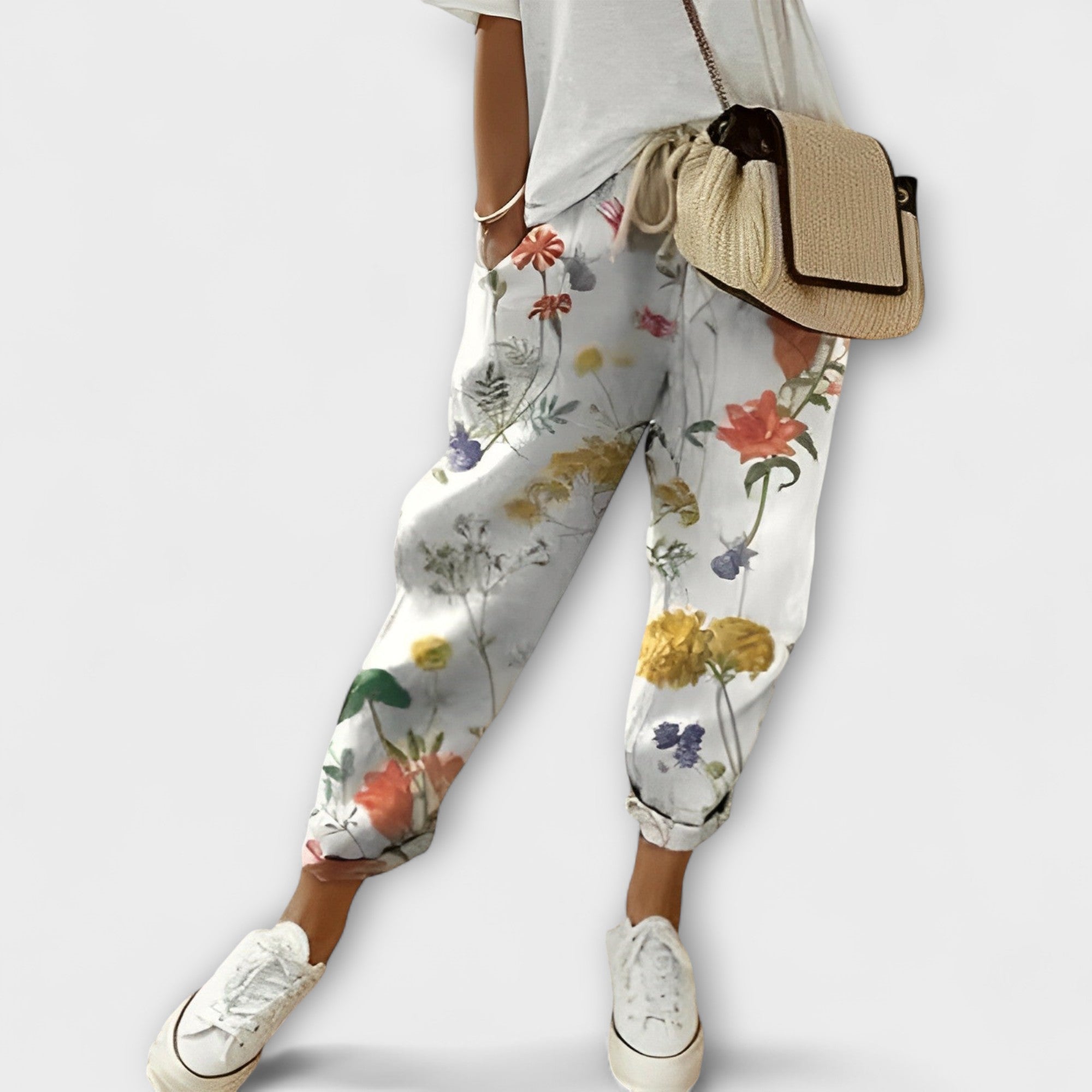 Boho tapered pants with white floral print, drawstring waist, elastic ankle cuffs
