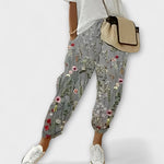 Boho tapered pants with gray floral print, drawstring waist, elastic ankle cuffs