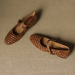 Brown woven leather sandals with ankle strap and gold-tone buckle