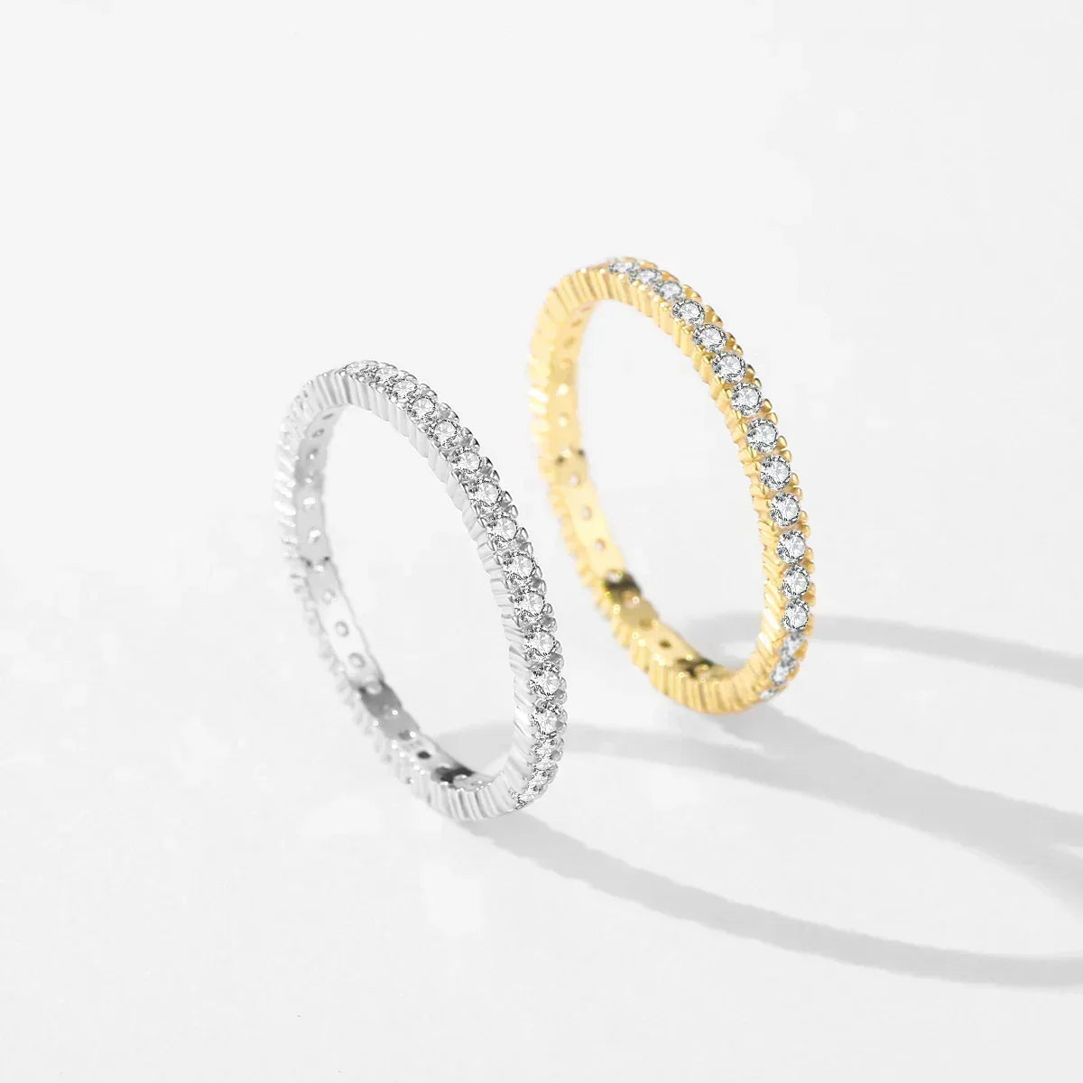 Minimal eternity ring set in gold and silver with pavé stones