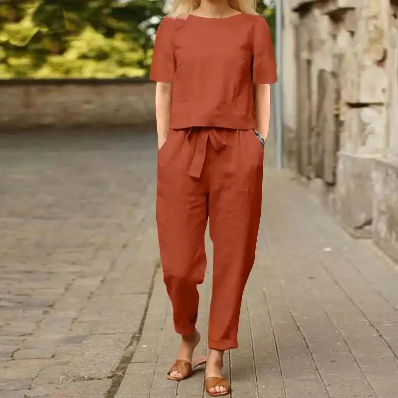Lili linen two-piece set in rust-red: short-sleeve top with tied waist and cropped pants