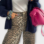 Leopard print vintage jeans, front button waist and tapered legs