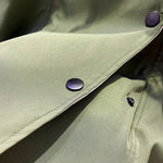 Modern jacket, sage green with snap buttons and buttoned pocket detail