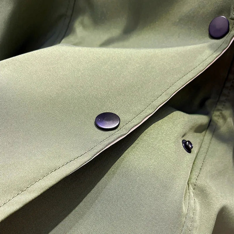 Modern jacket, sage green with snap buttons and buttoned pocket detail