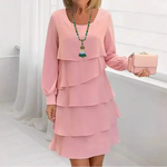 Pink comfort dress with tiered ruffles, long sleeves, and round neckline