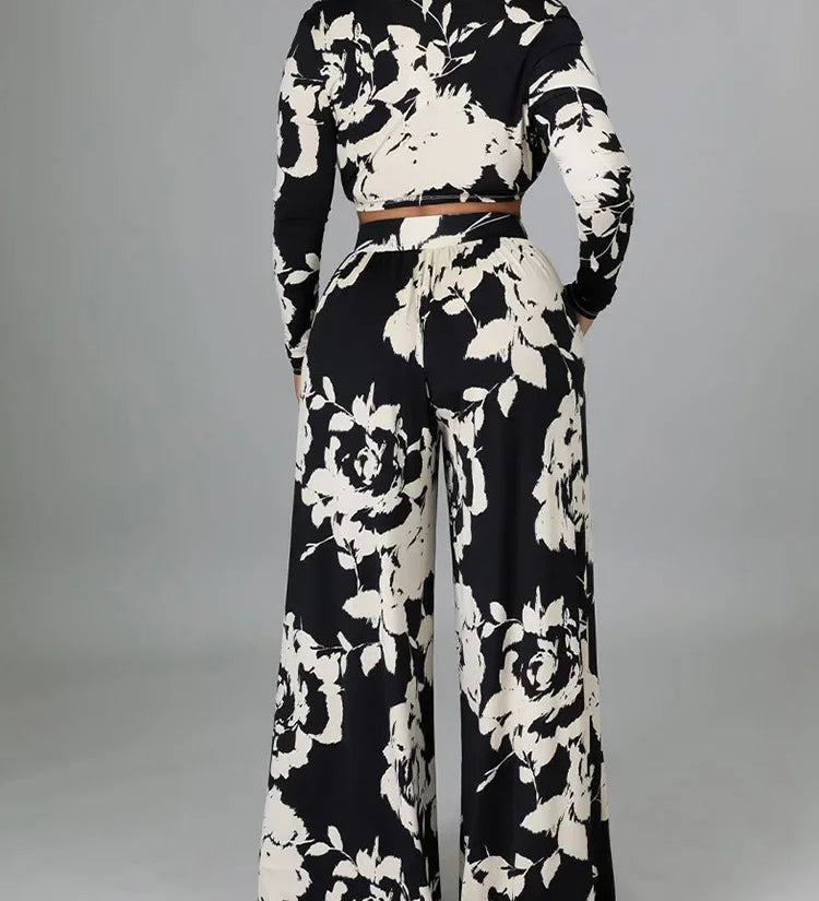 Black & white floral two-piece set with long-sleeve cropped top and wide-leg pants