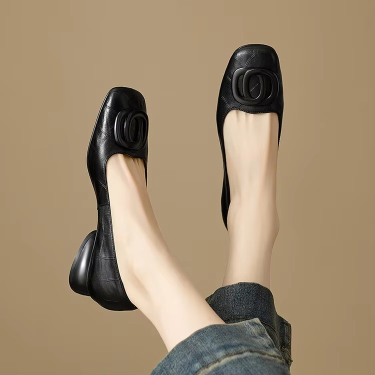Black soft leather ballet flats with rounded buckle, low heel sole
