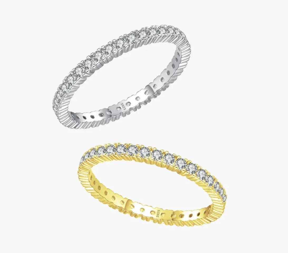 Eternity ring set with pavé stones in silver and gold