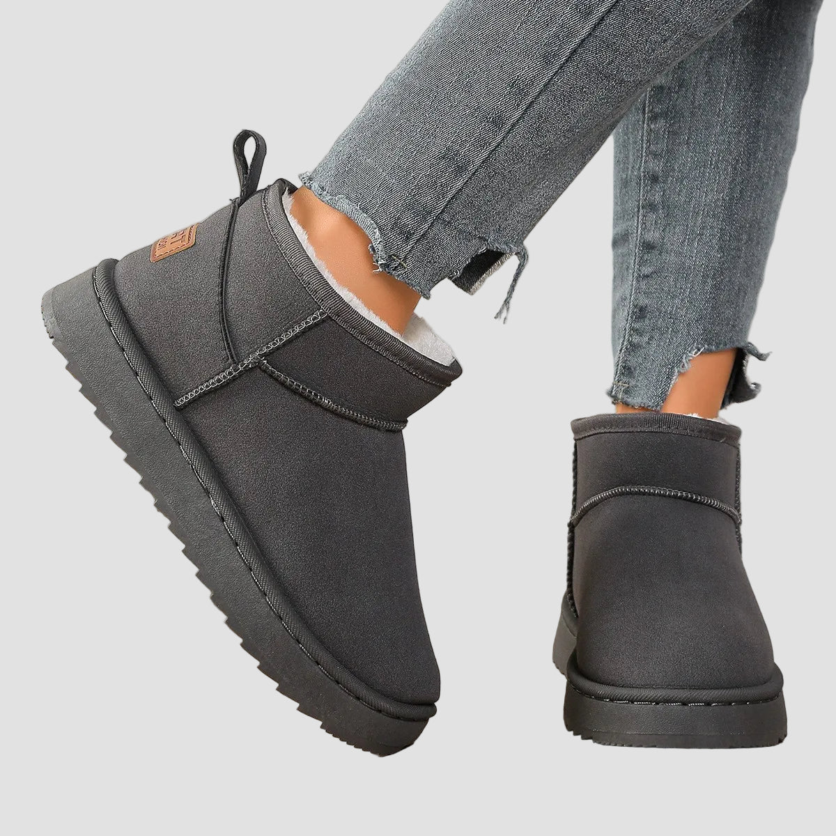 Grey ankle boots with round toe, side seam, pull tab, thick tread sole