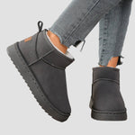 Grey ankle boots with round toe, side seam, pull tab, thick tread sole