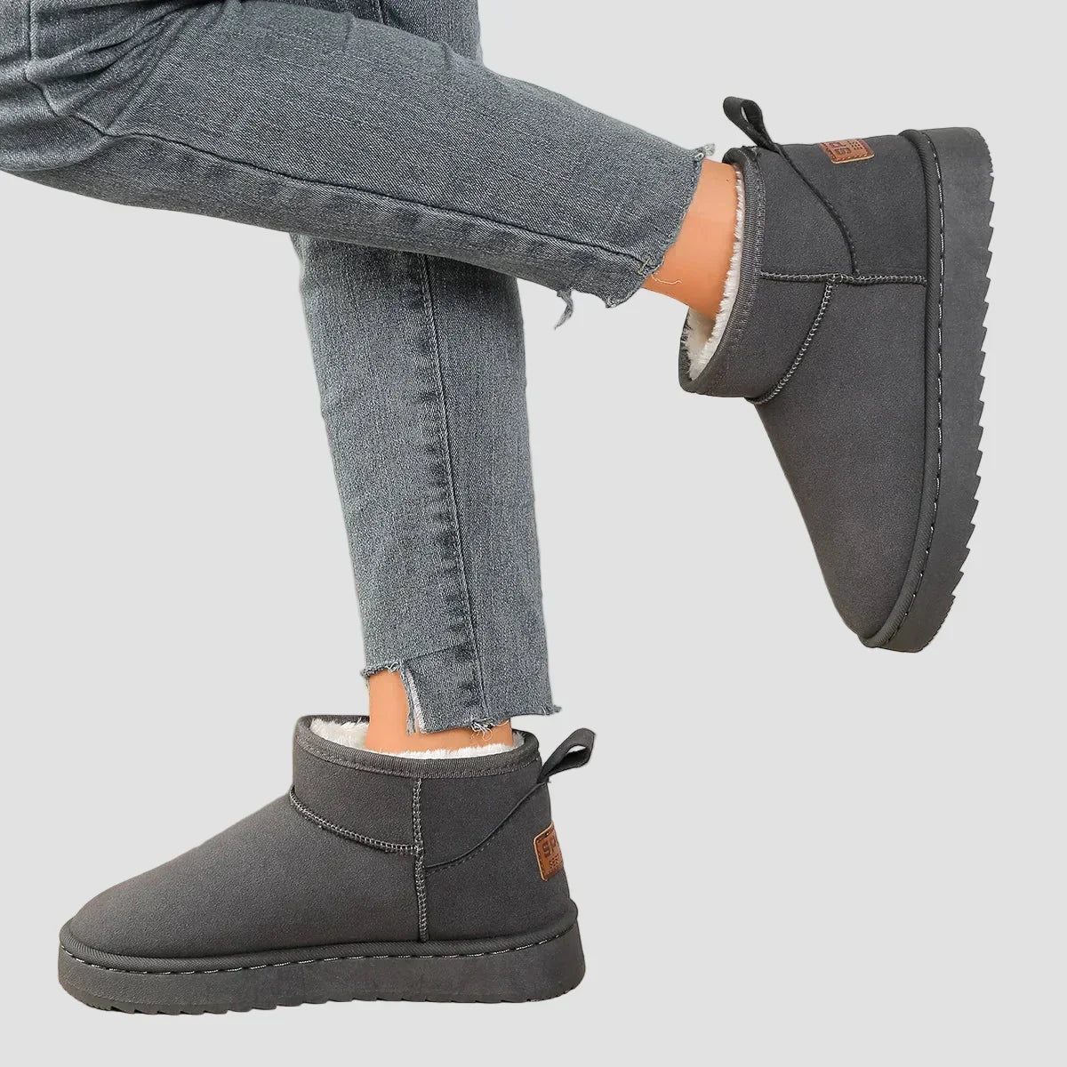 Grey comfort ankle boots with plush lining, pull tab, stitched seam, thick sole