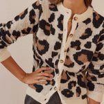 Leopard print knit cardigan sweater with button placket and long sleeves