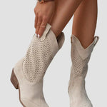 Light beige cowboy ankle boots with perforated panels and side zipper