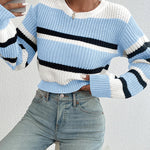 Oversized knit sweater in light blue and off-white with black horizontal stripe