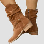 Light brown suede ankle boots with front strap detail and low stacked heel