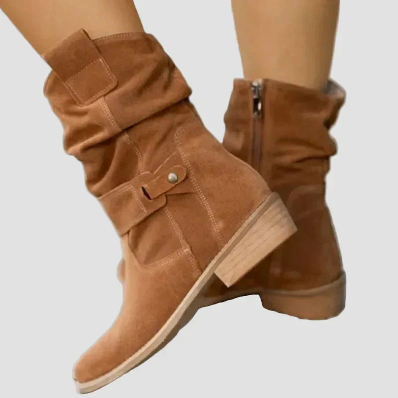 Light brown suede ankle boots with front strap detail and low stacked heel