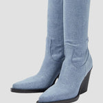 Light blue knee-high heeled boots with rounded square toe and block heel