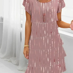 Victoria pink shift dress with dotted gold pattern, flutter sleeves, layered skirt hem